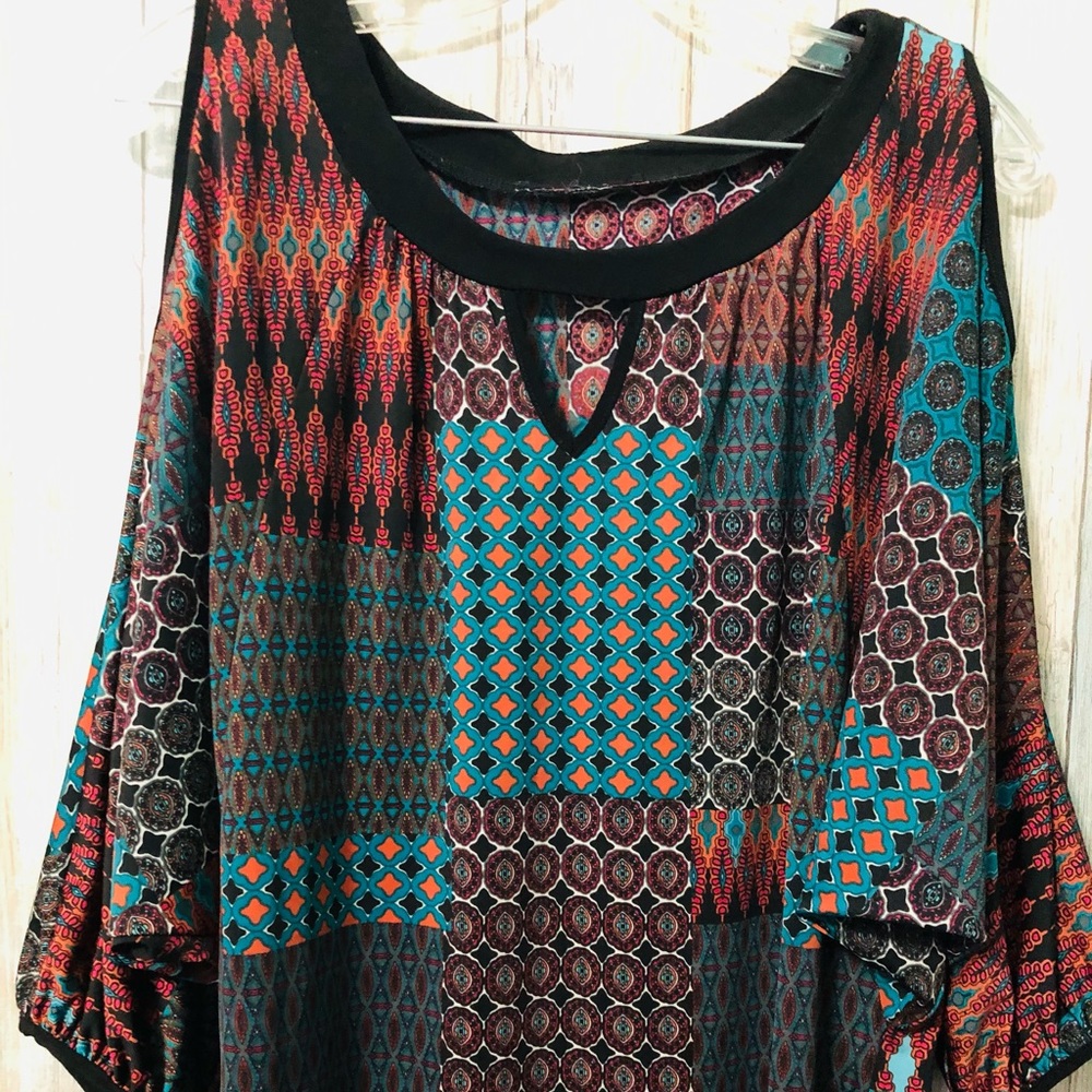 Pretty cold shoulder, bat wing top